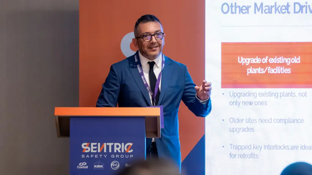 Speaker addressing the crowd at Safety by Design in Saudi Arabia event