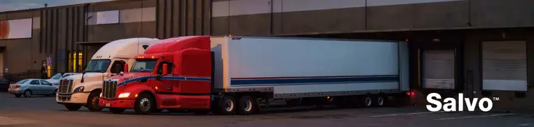 American truck at loading bay with Salvo brand visible
