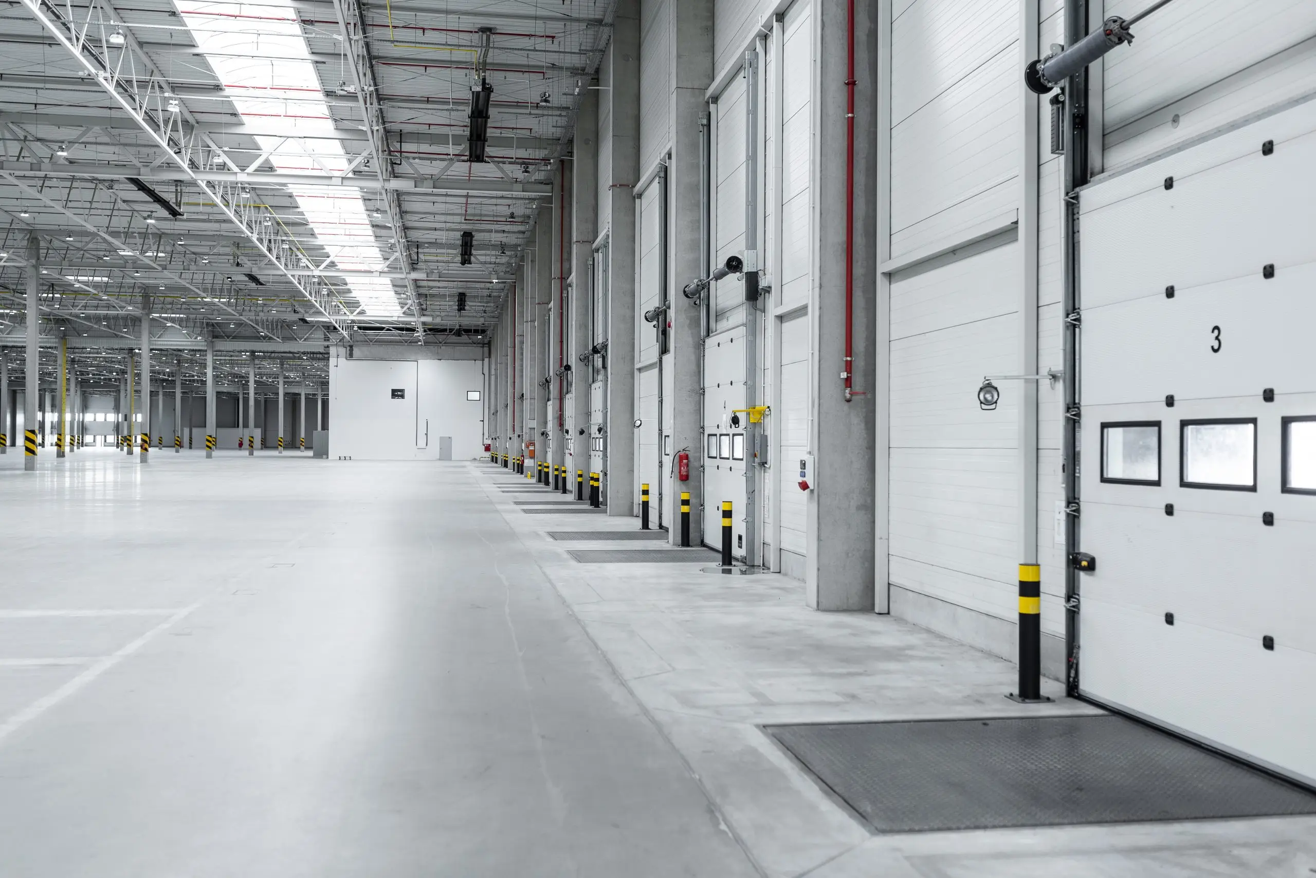 Empty loading docks at the logistics center from inside