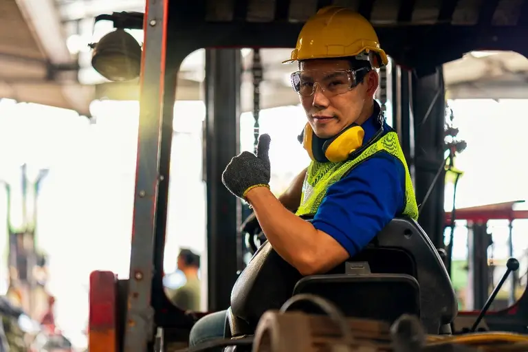Forklift Operator is thumb up