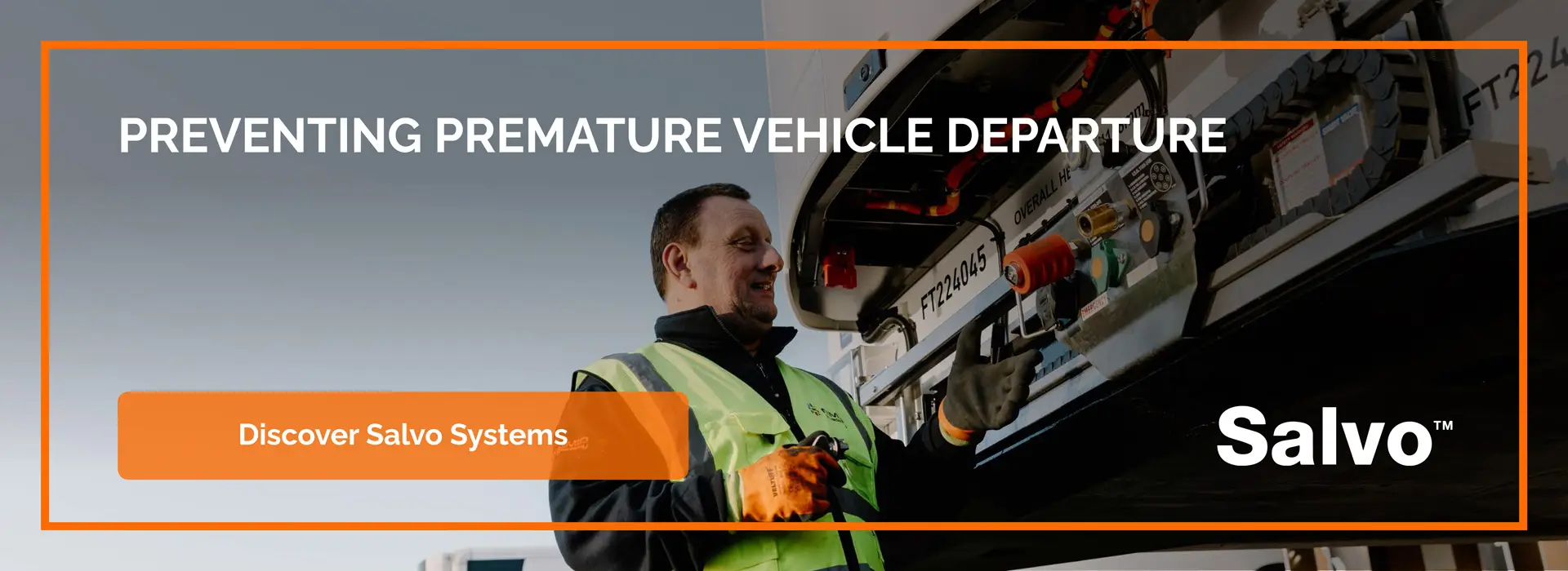 Driver operating Salvo equipment on the back of a lorry. Preventing premature vehicle departure. Discover Salvo systems