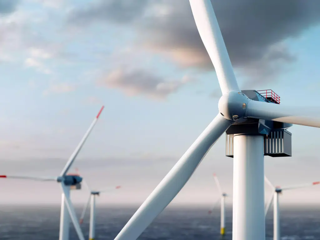 Parc éolien et énergétique en mer avec de nombreuses éoliennes sur l'océan. Production d'électricité durable