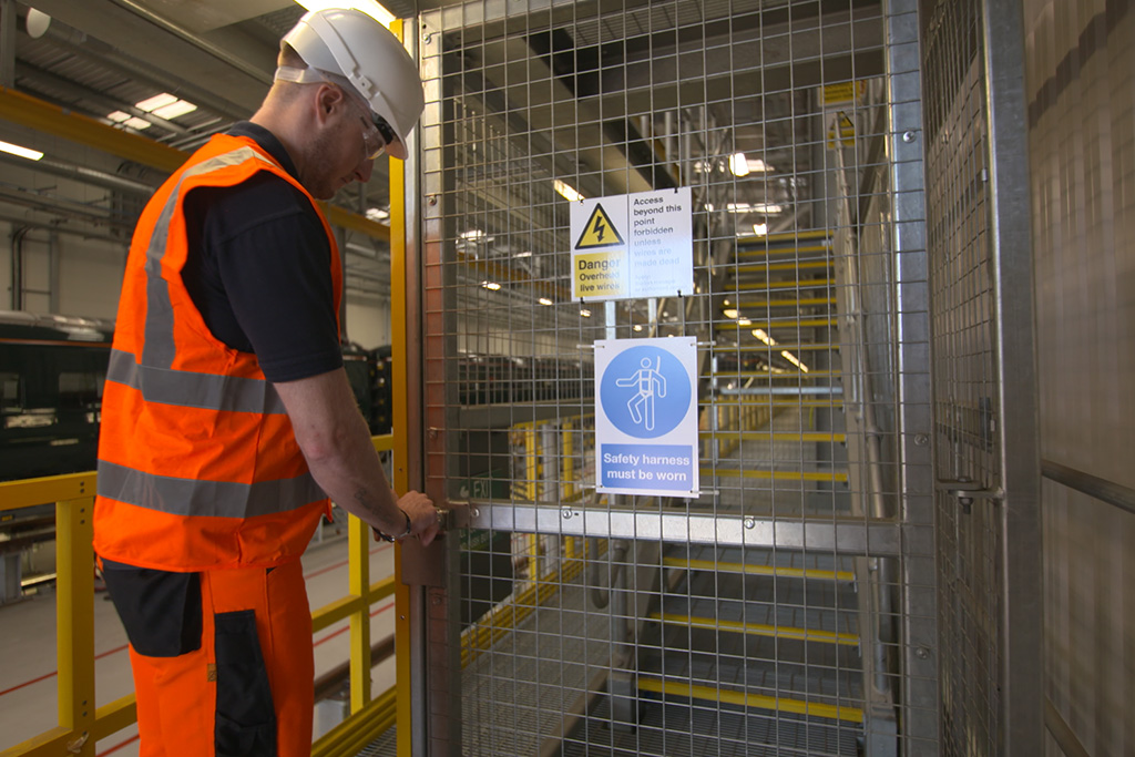 Railway warehouse operator opens a secure access door